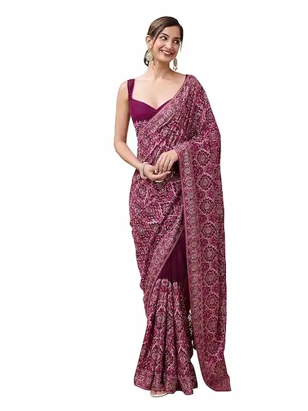 pastel pink vichitra saree with light embroidery, neat pleats and flowing pallu for festivals.