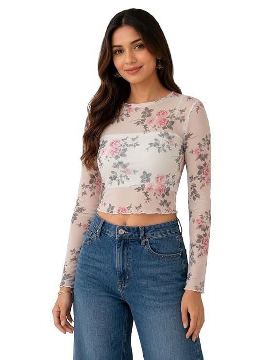 white floral mesh crop top with full sleeves styled with blue jeans
