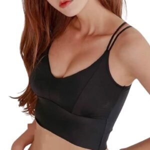 black padded bralette top with double straps worn as a crop top